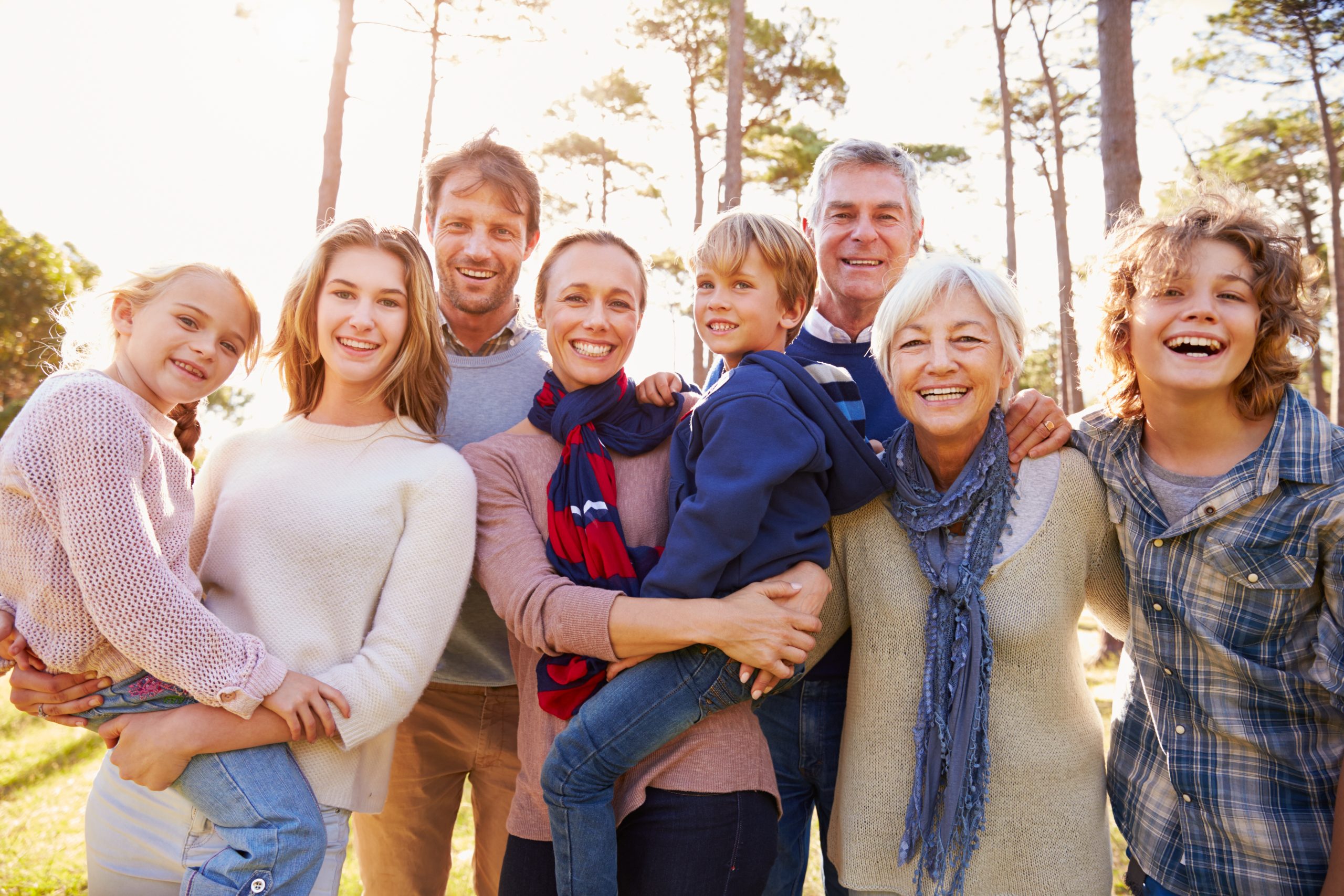 Happy multi-generation family portrait in the countryside